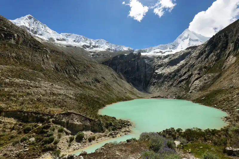 Turquoise Humantay Lake beneath the snow-capped peak